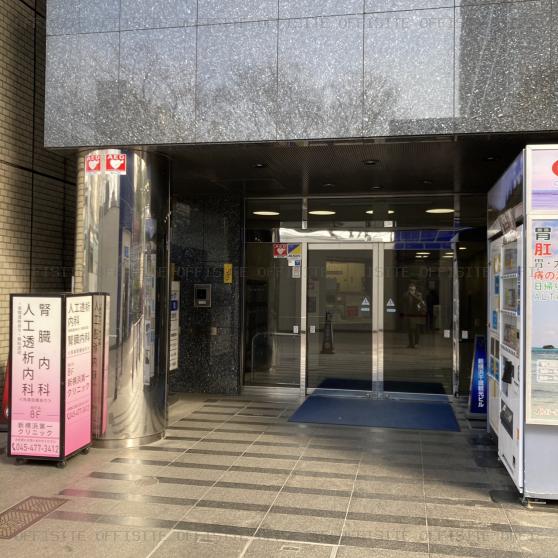 新横浜千歳観光ビルのオフィスビル出入口