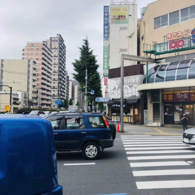 オカバツインタワービルイースト ビル前面道路